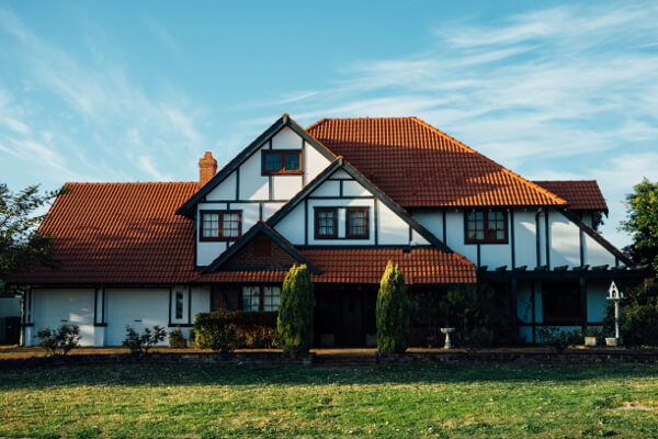 Large white rural house by Jesse Roberts on Unsplash